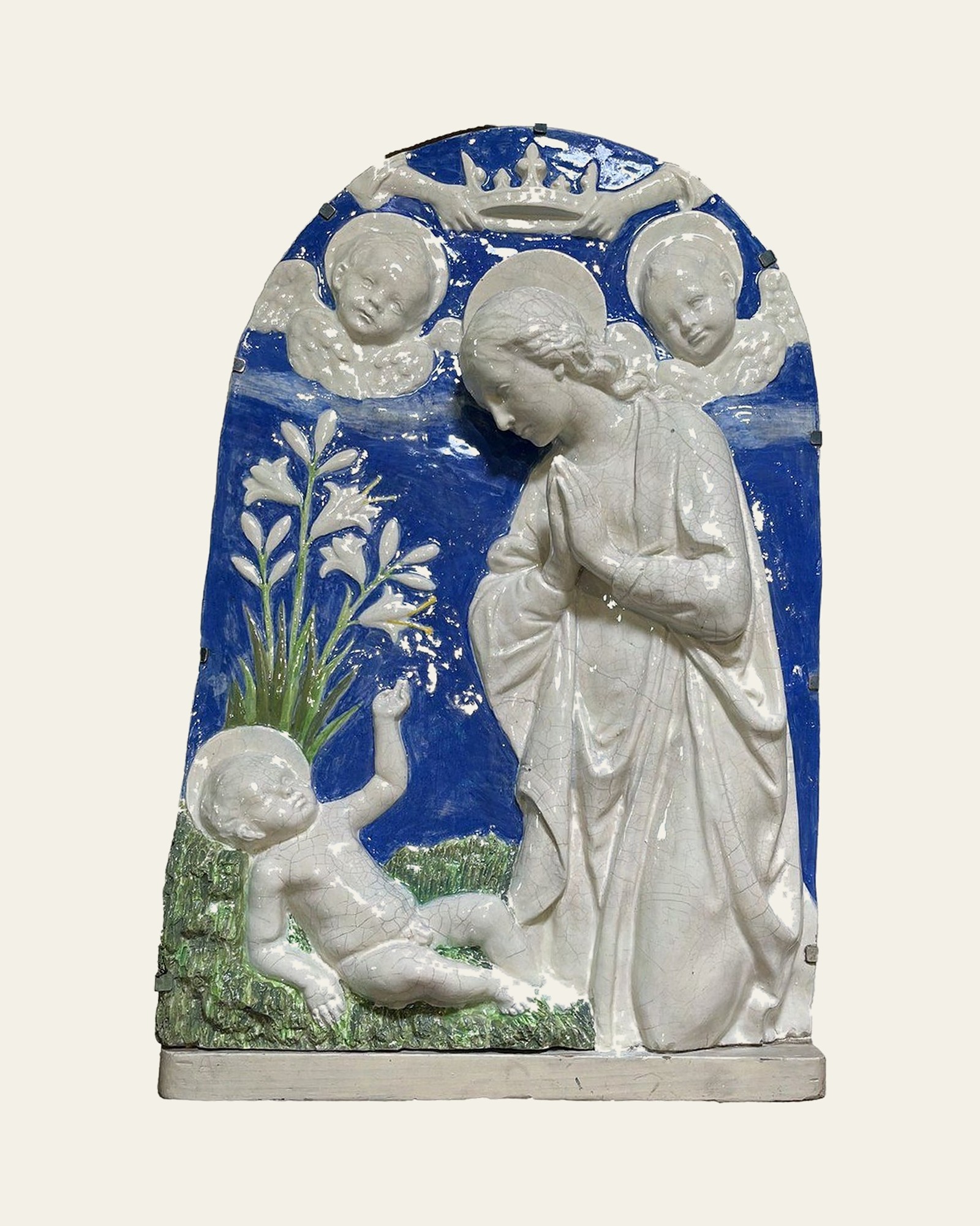 Della Robbia-style tin-glazed earthenware plaque after conservation and restoration: re-bonded, filled and retouched.